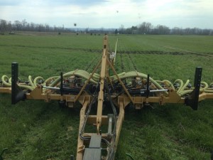 Manure injection machine with hoses visible