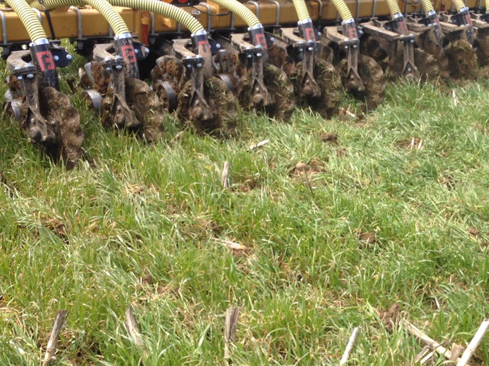 A closer view of manure being injected into a field